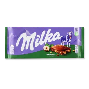 Шоколад молочний Milka з подрібненим лісовим горіхом - Photo 1
